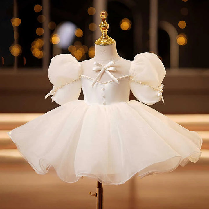 TinyTulle Ivory Puff Sleeve Princess Flower Girl Dress with Bow Detail