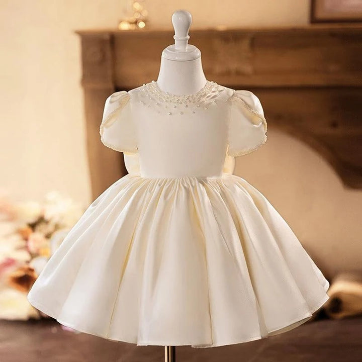 TinyTulle Elegant Ivory Satin Baby Girl Dress with Pearl Beaded Neckline for First Communion