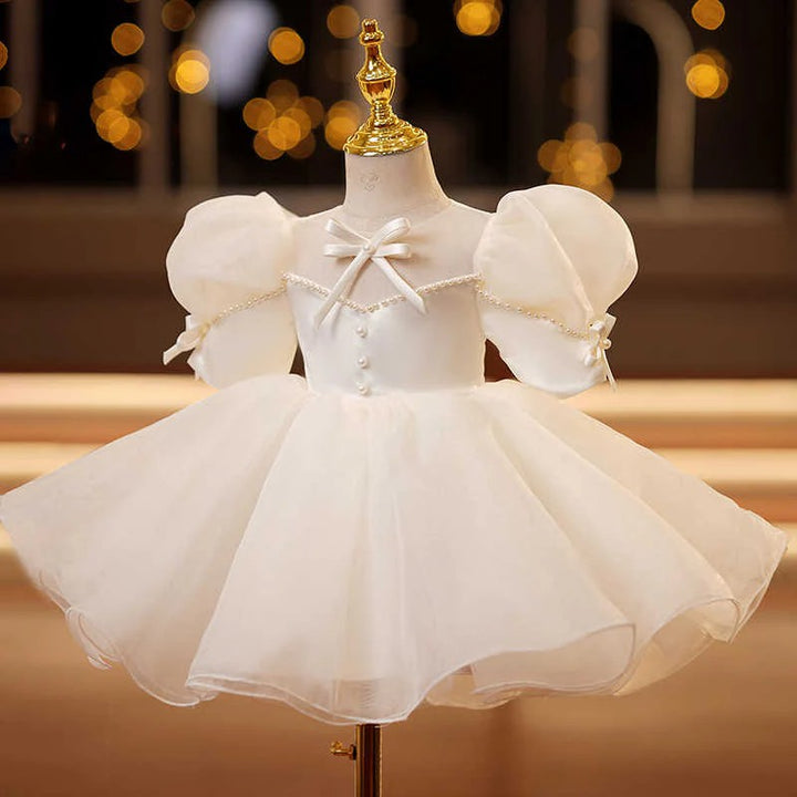 TinyTulle Ivory Puff Sleeve Princess Flower Girl Dress with Bow Detail