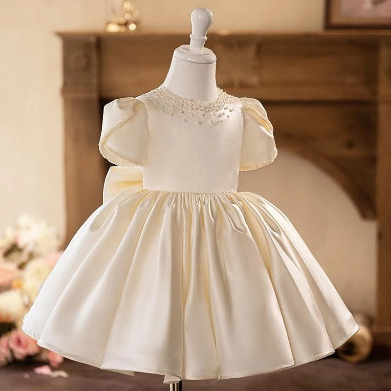 TinyTulle Elegant Ivory Satin Baby Girl Dress with Pearl Beaded Neckline for First Communion