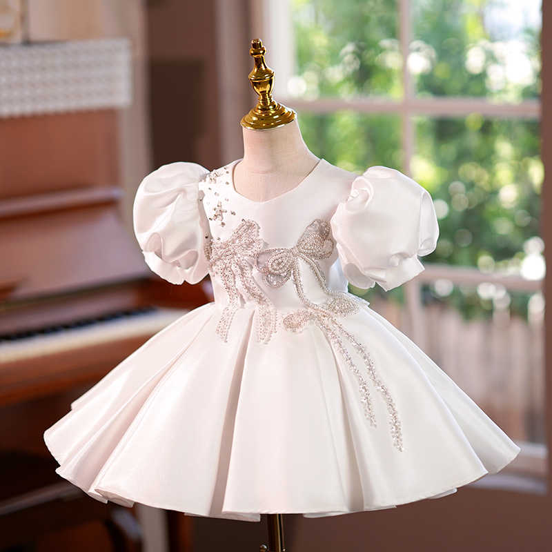 TinyTulle Elegant White Puff Sleeve Princess Flower Girl Dress with Beaded Butterfly Details