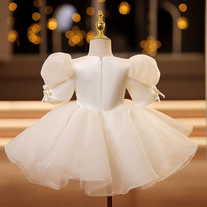 TinyTulle Ivory Puff Sleeve Princess Flower Girl Dress with Bow Detail