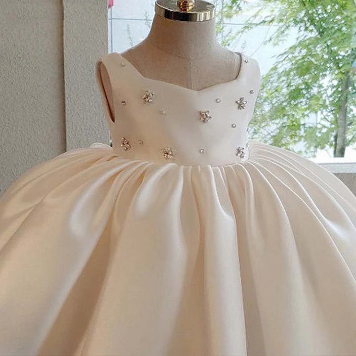 TinyTulle Elegant Sweetheart Neck Satin Flower Girl Dress with Bow and Beaded Details