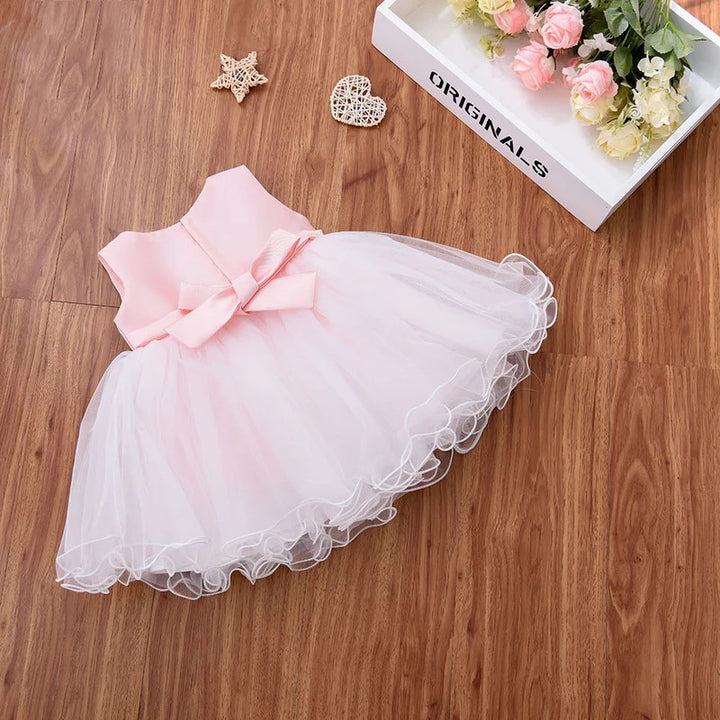 TinyTulle Pink Satin Bow White Tulle Flower Girl Dress with Beaded Details