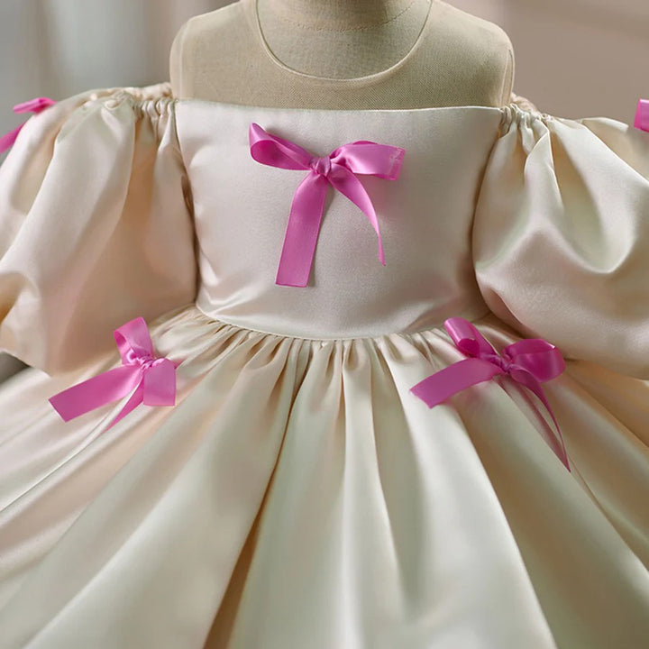 TinyTulle Ivory Satin Puff Sleeve Flower Girl Dress with Pink Bow Accents