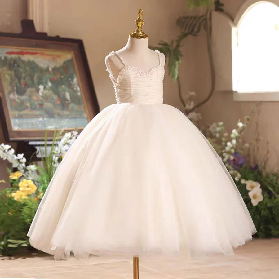 SunnyPetal Elegant Ivory Beaded Flower Girl Dress with Spaghetti Straps