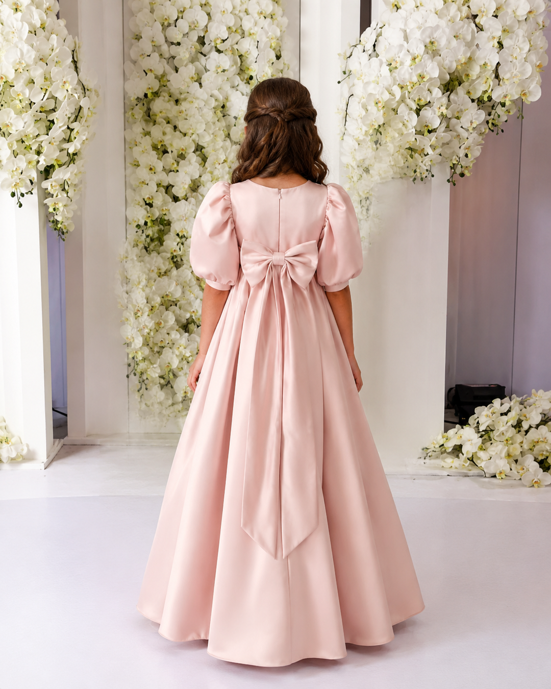 TinyTulle Elegant Pink Satin High-Waisted Puff Sleeve Flower Girl Dress with Bow Detail