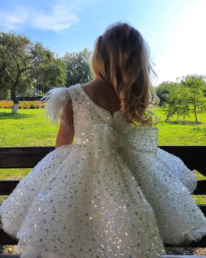 TinyTulle White Sequin Tulle Flower Girl Dress with Feather Shoulders and Bow Back