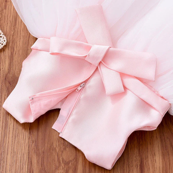 TinyTulle Pink Satin Bow White Tulle Flower Girl Dress with Beaded Details