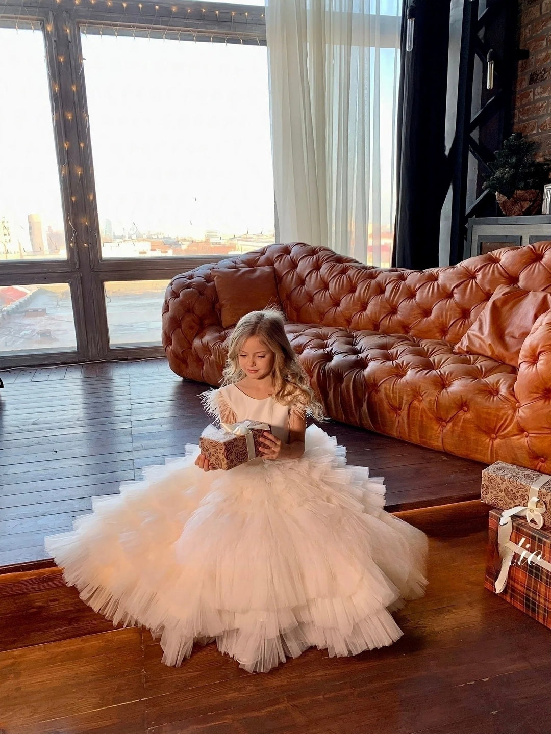TinyTulle Elegant White Sleeveless Feathered Layered Tulle Flower Girl Dress